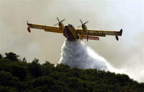 Greece sends two Canadair fire fighting aircraft to help Cyprus fight a forest fire